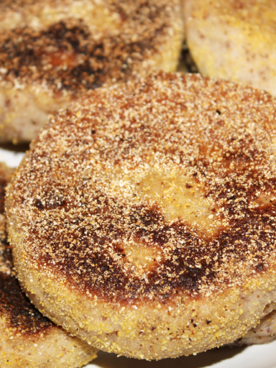 Close up of english muffins pile on a plate
